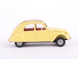 yellow toy car on a white surface with a white background