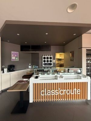 an image of a glasshouse coffee shop in a mall
