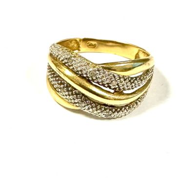 a close up of a gold and diamond ring on a white background
