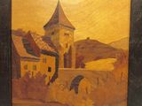 une image représentant un tableau où l'on voit une église et un pont
