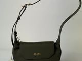 a close up of a purse with a tag on it
