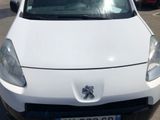 a picture of a white car parked in a parking lot