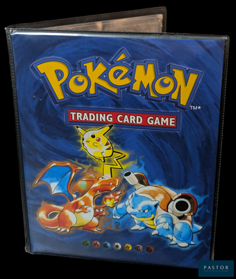 pokemon trading card game in a plastic case on a black background
