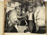 an old photo of a group of men shaking hands