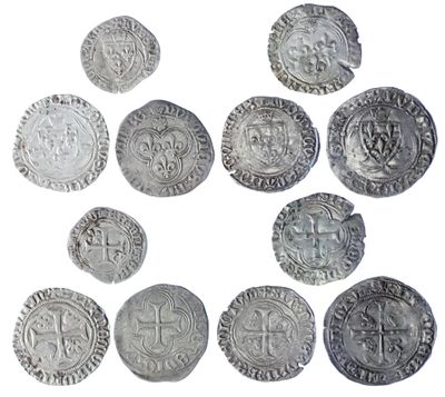 une image représentant un groupe de pièces d'argent sur fond blanc