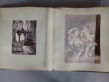 a book open to a picture of a group of nudes