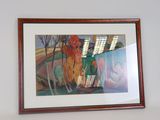 a picture of a painting on the wall above a bed