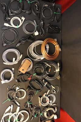 a table with many different types of cables on it