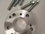 the screws and nuts are on top of the metal plate