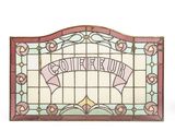 a stained glass window with the words coffee up on it