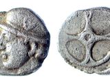 l'image d'une pièce d'argent sur laquelle figure le visage d'une femme