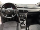 the interior of a car with a steering wheel, dashboard, and dashboard controls