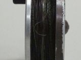 an image of a reel with a spool on it