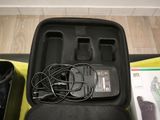 a black case with a charger and a charger in it