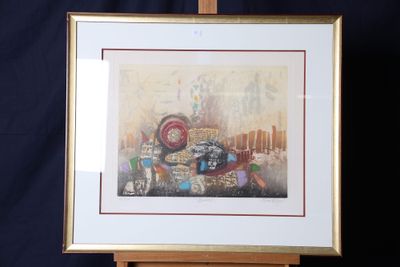 painting of a cityscape in a gold frame on a black background