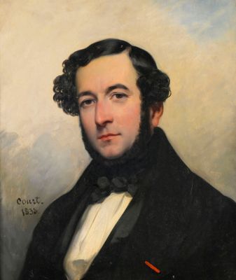 portrait d'un homme en costume noir et nœud papillon