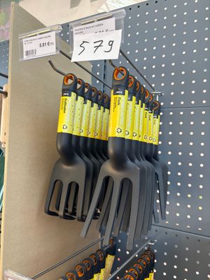 a lot of plastic utensils on display in a store