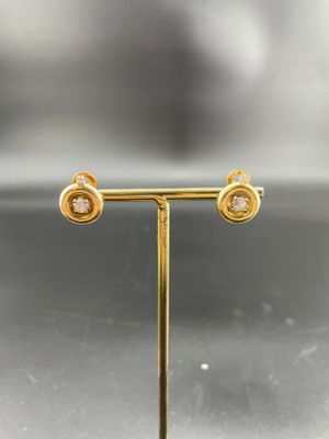 Paire de boucles d'oeilles en or jaune 18 K 750/°° ornées de…