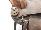 a saddle that is sitting on top of a stool