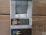 a package of window blinds in a store