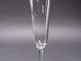 a wine glass that is sitting on a table