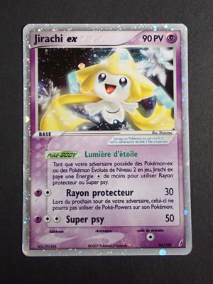 a close up of a pokemon card on a table
