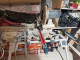 an image of a cluttered room with tools on the shelves