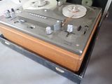 a picture of a reel player with a tape recorder in it