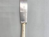 a knife that is sitting on a table
