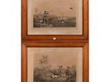 two framed prints of hunters and their dogs in a wooded setting