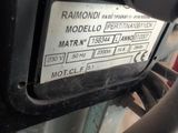 a close up of a motor bike with a sticker on it