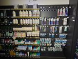 many bottles of alcohol on the shelves in the store