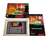 two nintendo games in a box on a white surface