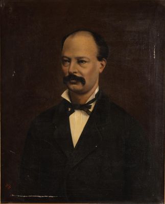 le portrait d'un homme en costume et nœud papillon