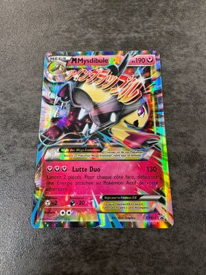 a close up of a pokemon card on a table