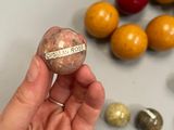 a person holding a rock with a message on it
