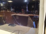 a picture of a broken tv screen in a room