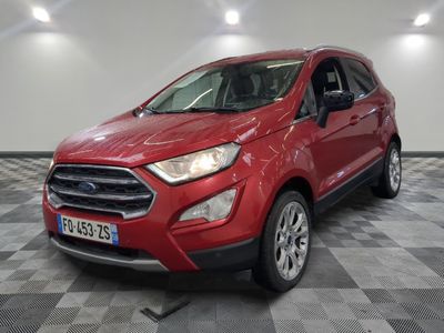 a red ford eco - cross is parked in a large room