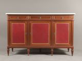 une armoire rouge à deux portes avec un plan de travail en marbre