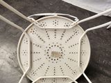 an image of a white ironing board on the floor