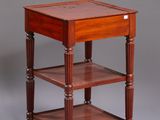 an image of a small wooden table with three shelves