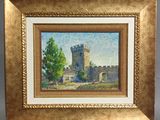 un tableau représentant un château, encadré d'or, accroché au mur
