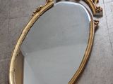 a mirror that is on the floor in the room