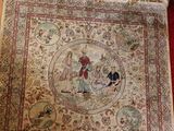 an image of a rug with a picture of a man and a woman on it