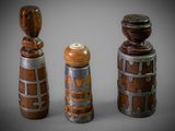 trois types différents de salières et poivrières sur un fond gris