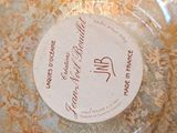 a close up of a glass bowl with a label on it