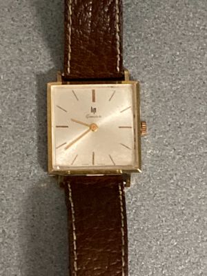 a watch that is sitting on top of a table