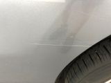 a close up of a tire on a car ' s side