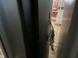 a door that is open in a room with a black door