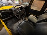 a view of the inside of a vehicle from the driver ' s seat